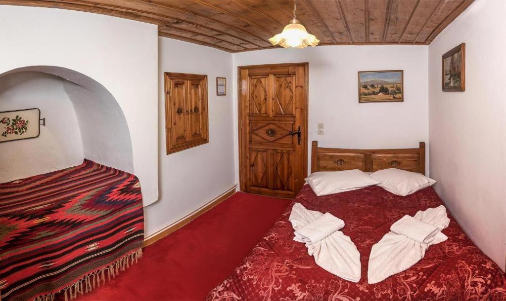 Отель Archontiko Repana - Makrinitsa Stone Retreat Номер фото